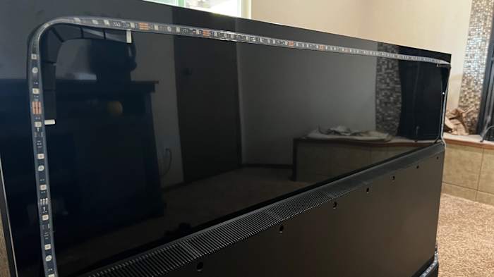 The 65-inch or 85-inch lightstrip attaches to back of the TV.